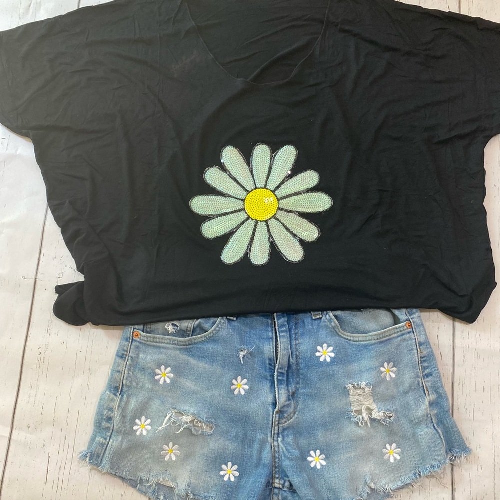 Daisy on black t-shirt